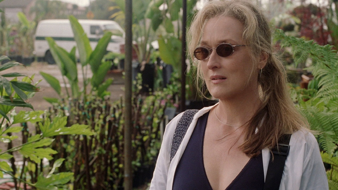 Susan Orlean at a Florida plant nursery in sunglasses