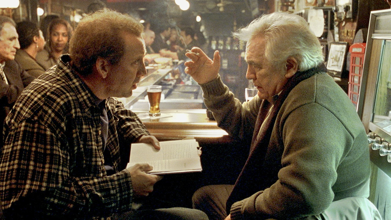 Charlie listening to screenwriting guru Robert McKee at a bar