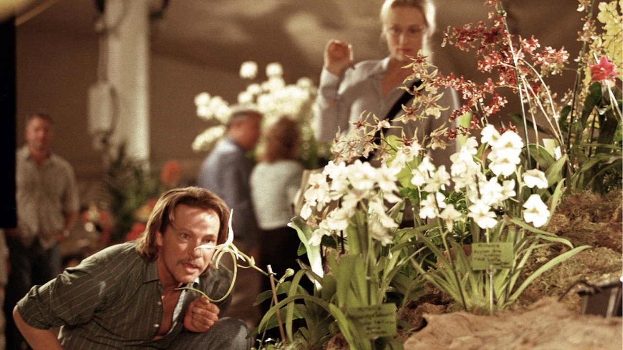 Laroche and Susan among the blooms at the orchid show