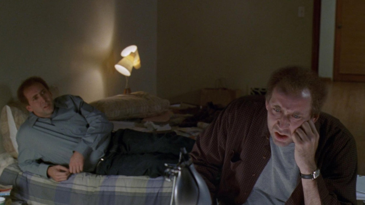 The two brothers slumped in a dim apartment