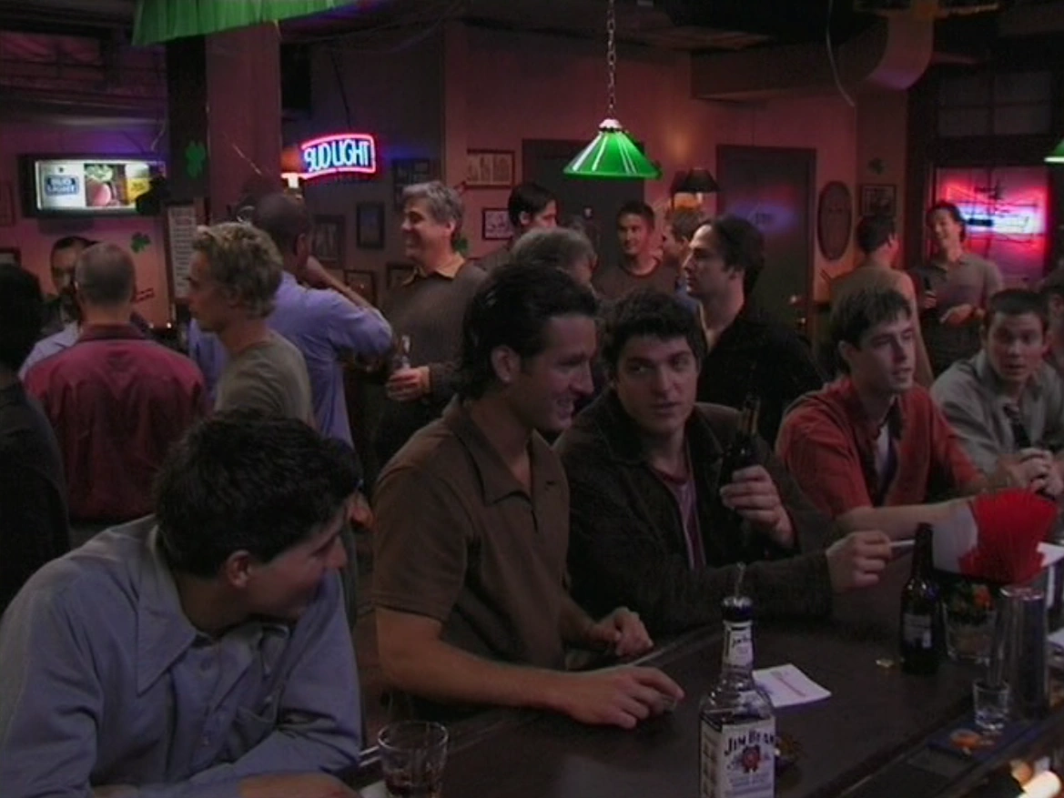 Still from It's Always Sunny S01E01: Paddy's packed as a gay bar