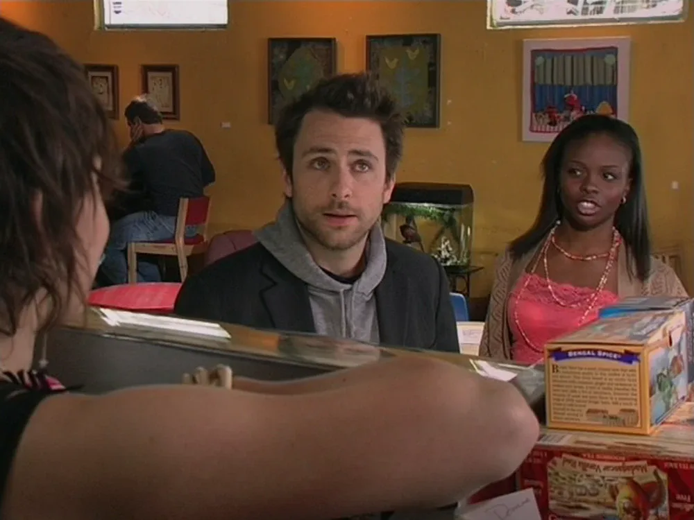 Still from It's Always Sunny S01E01: Charlie at the coffee shop