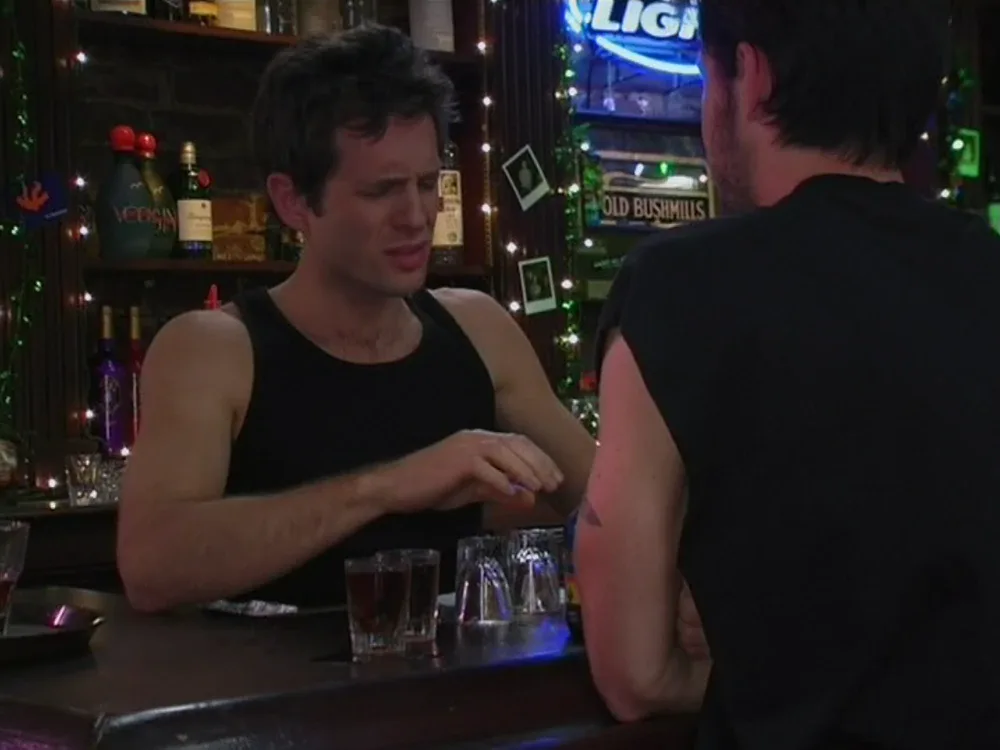 Still from It's Always Sunny S01E01: Dennis, drunk
