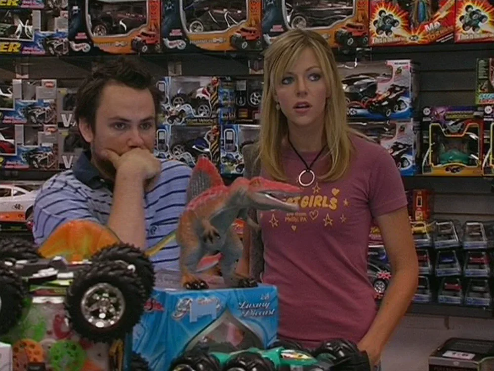 Still from It's Always Sunny S01E02: Charlie and Dee at the toy store