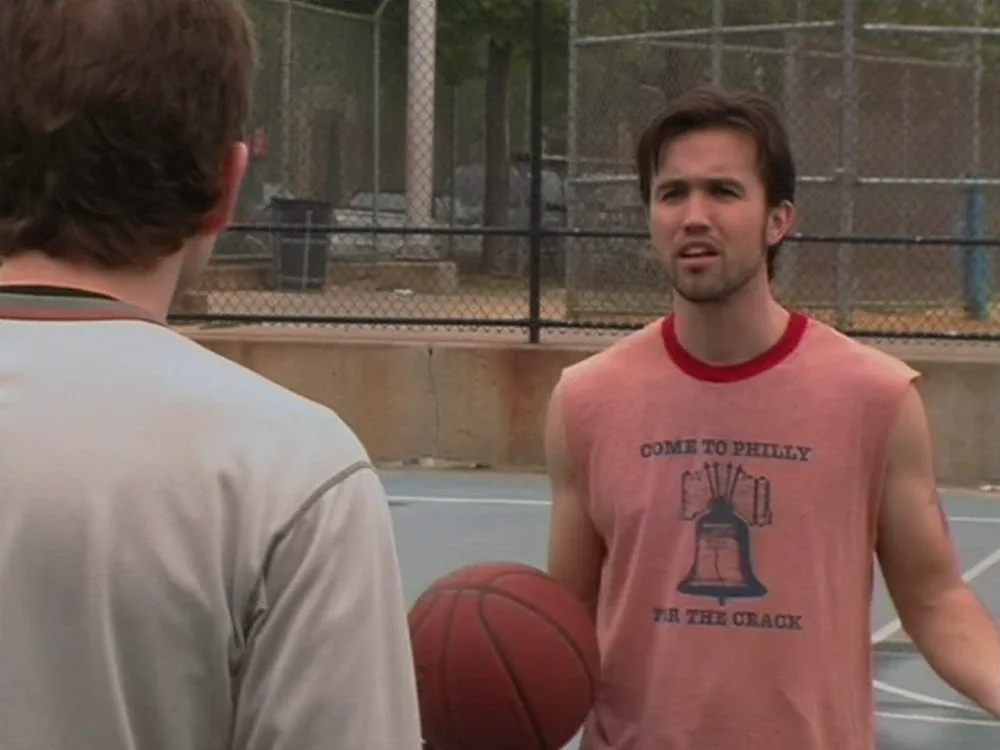 Still from It's Always Sunny S01E02: Mac plays basketball