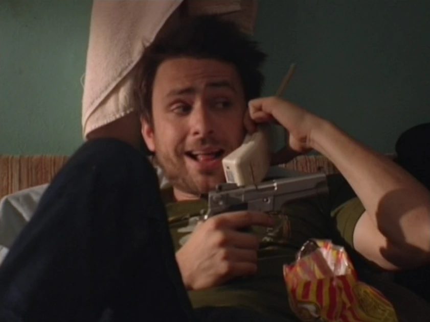 Still from It's Always Sunny S01E05: Gun fever takes hold