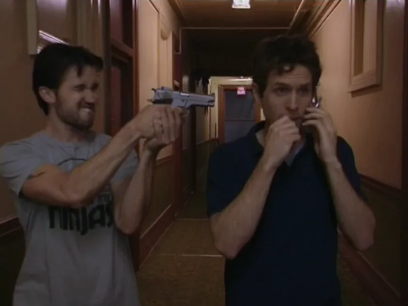 Still from It's Always Sunny S01E05: Mac aims at Dennis