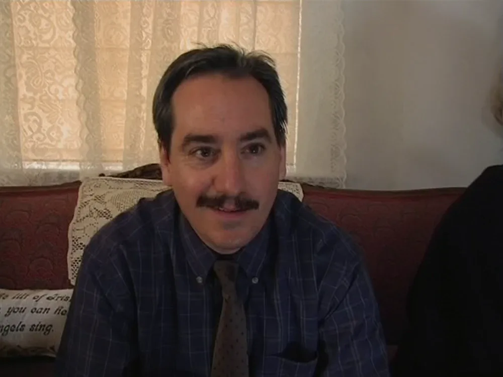 Still from It's Always Sunny S01E07: Uncle Jack, delighted